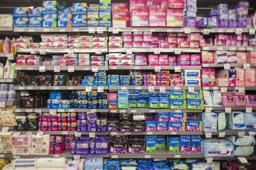 An overwhelming display of the various tampons and sanitary pads when one menstrual cup would do