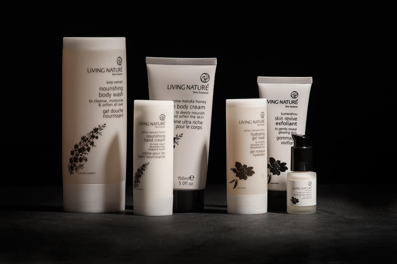 A variety of Living Nature beauty products are displayed without their boxes