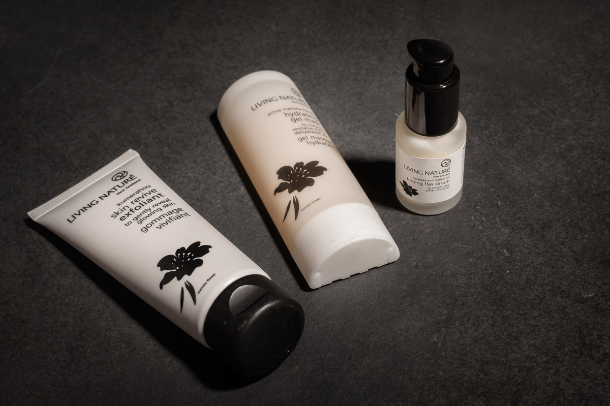 Three Living Nature beauty products are displayed without their boxes
