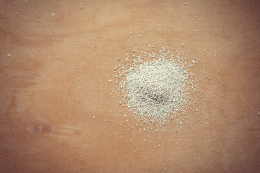 Finely ground egg shell used as a calcium supplement is seen on a table