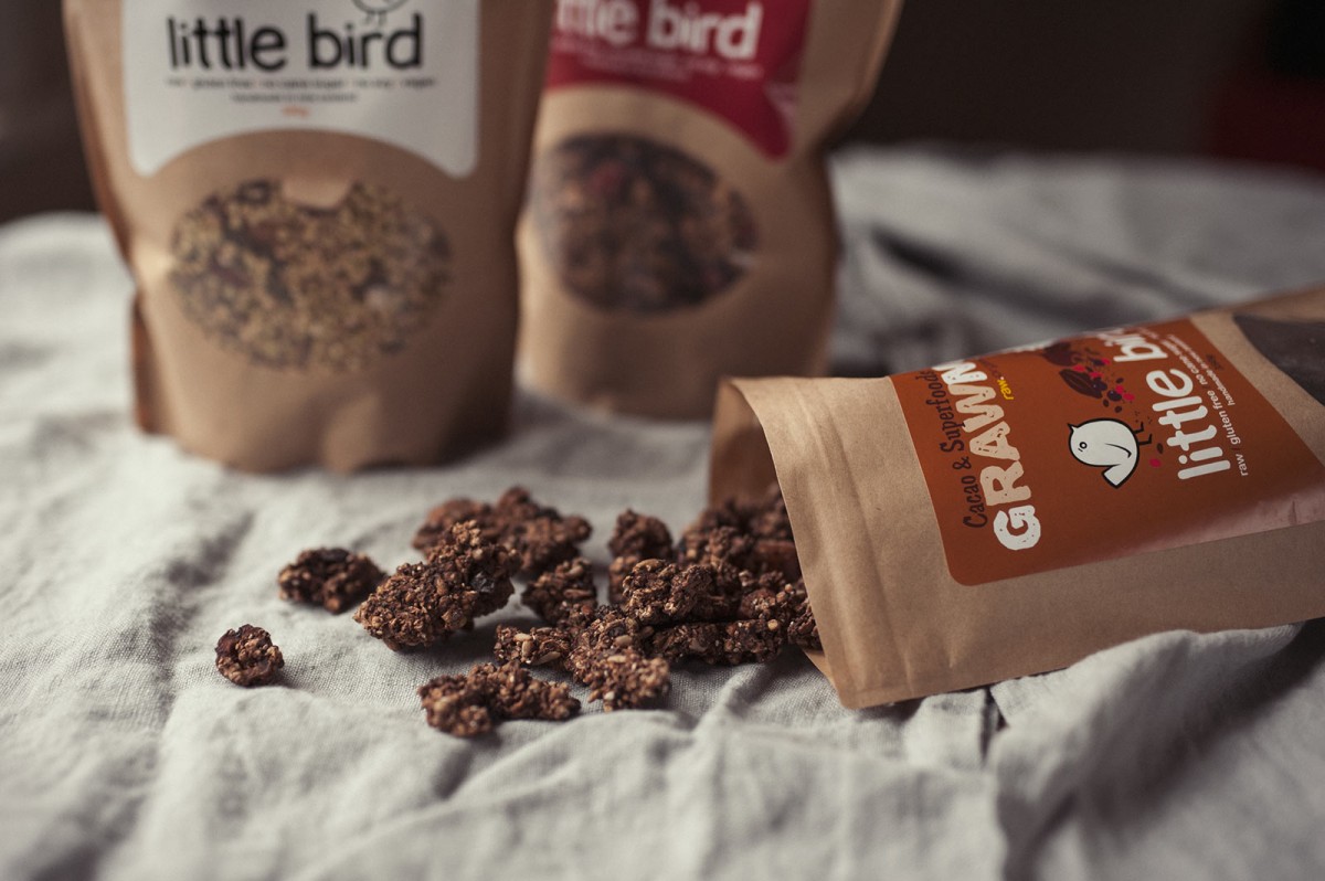 Various Little Bird cereals which make a good protein snack are displayed on a table cloth