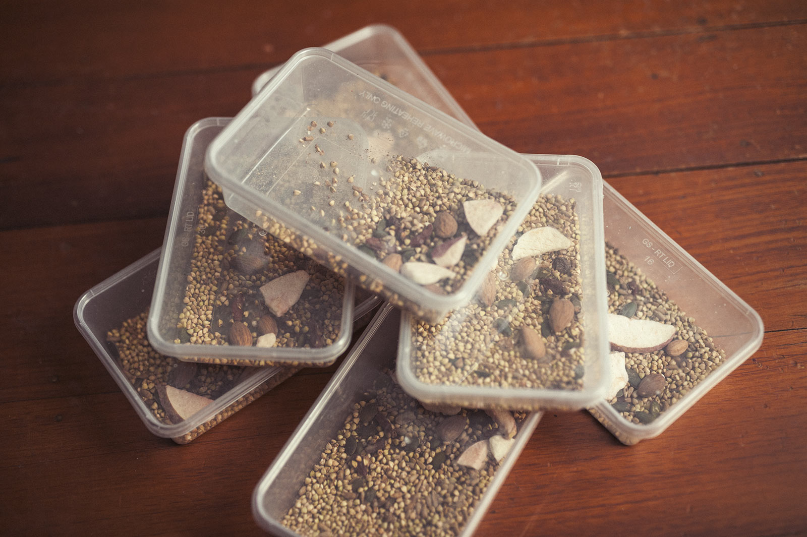 Various Little Bird cereals are portioned and packed into containers as they make a good protein snack