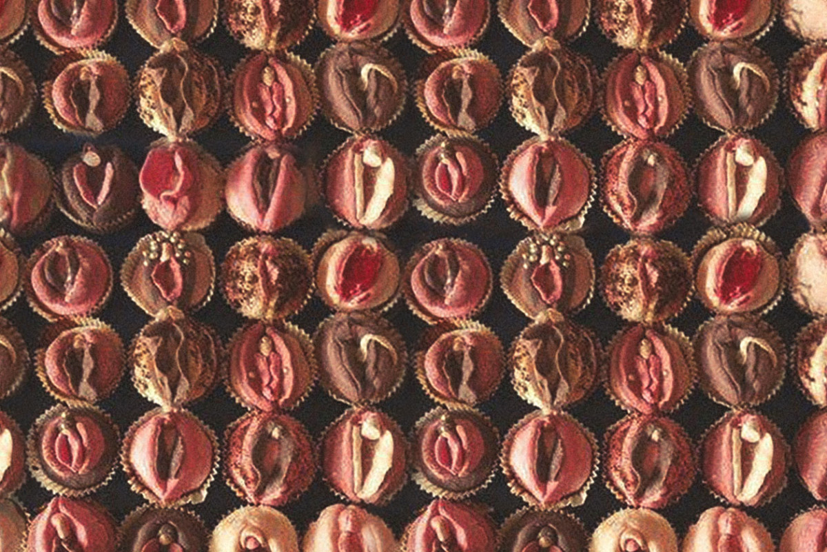 A closely packed display of cupcakes that look like vaginas