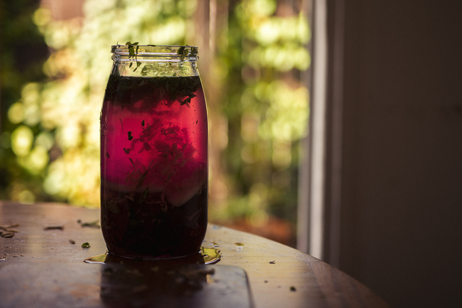 Beetroot Kvass sits in a jar on a table this drink is good for your health