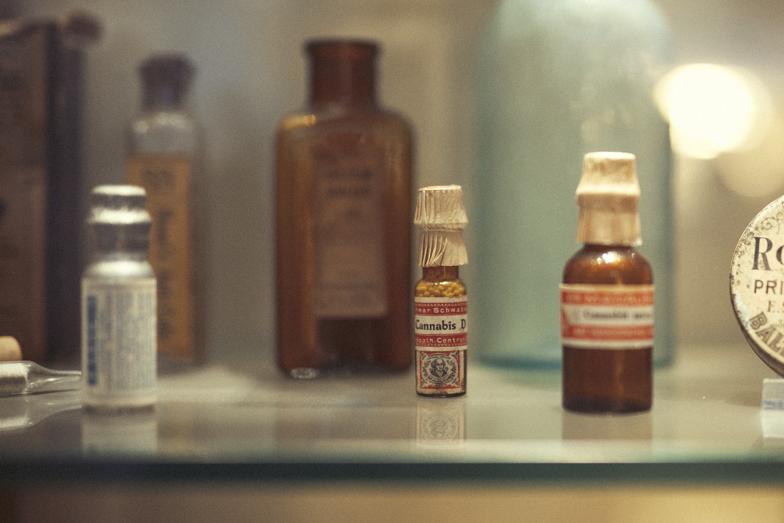 Bottles of medicine in a display stand at a Museum in Amsterdam