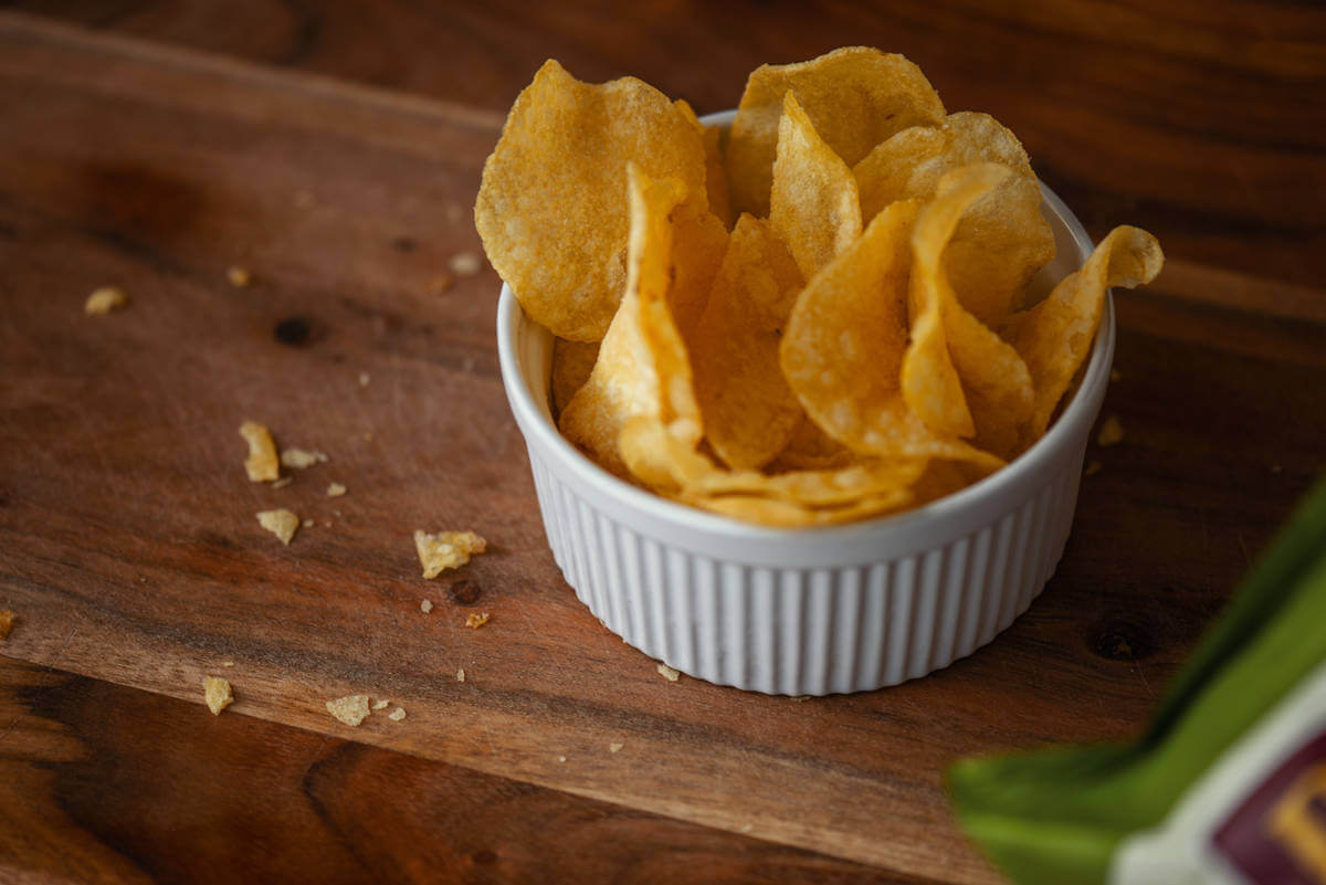 How to overcome behavioural addictions. Use portion control – a serving size bowl of crisps.